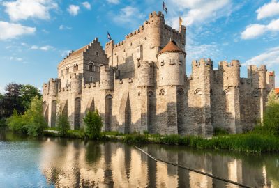 Gravensteen castle in Ghent with its reflection in the water