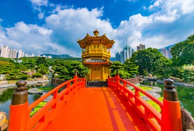 Yellow pagoda and orange bridge at Nan Lian Garden Hong Kong