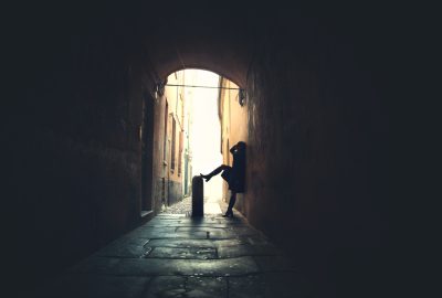 Street hooker waiting in back alley in Florence