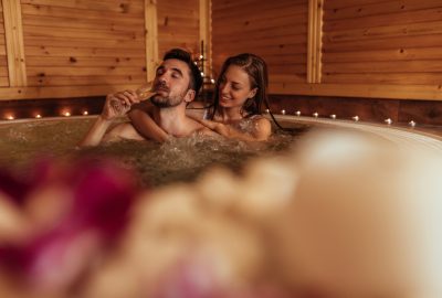 Couple taking a relaxing bath in Munich FKK sauna club
