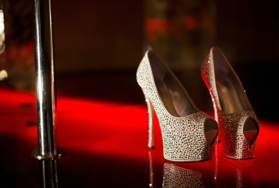 High heels standing next to pole in Munich striptease club