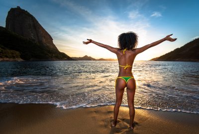 Rio de Janeiro escort girl in bikini at Copacabana beach