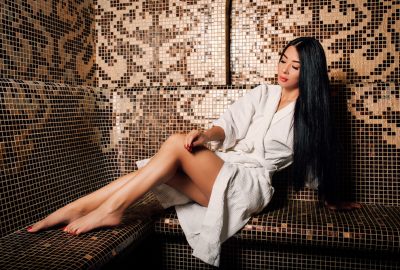Asian girl in sauna of Sydney erotic massage salon