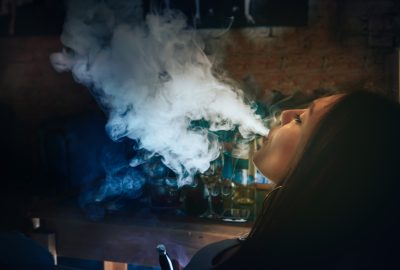 Girl smoking hookah in Tel Aviv night club