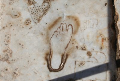 Sign pointing to brothel on site of Ephesus in Turkey, carved in the Marble Road