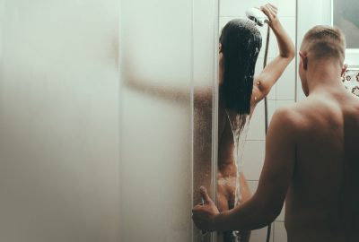Couple taking shower prior to erotic massage in Bucharest hotel 