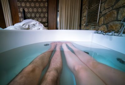 Couple in Jacuzzi of massage and spa salon in Geveva 