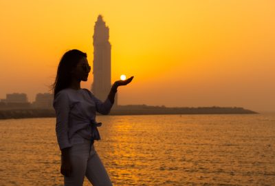 Beautiful woman enjoying sunset in Abu Dhabi