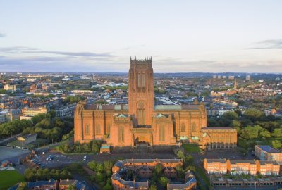 Frontal view of the huge Liverpool Cathedral, bathing in early evening light
