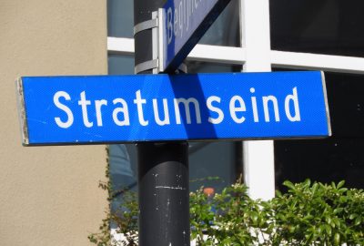 Street sign indicating the beginning of Stratumseind in Eindhoven